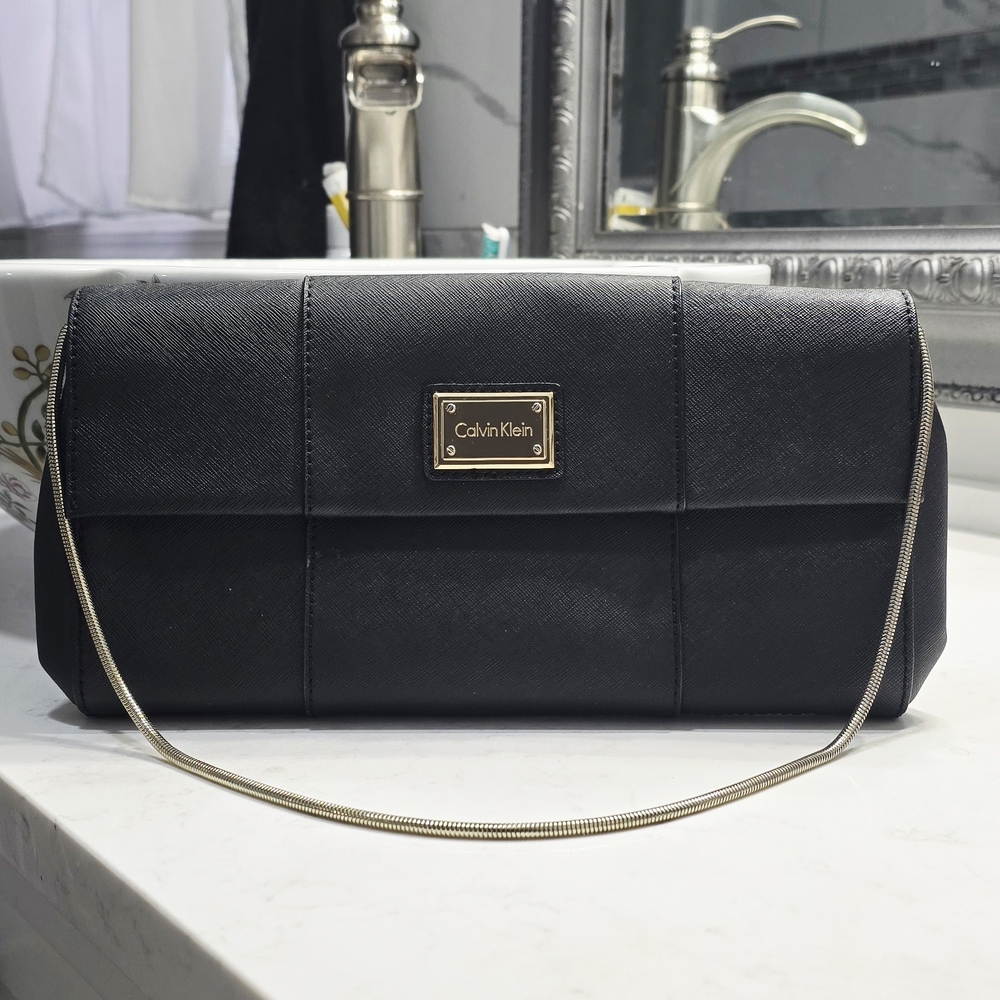 Calvin Klein Black Clutch with Gold Accents